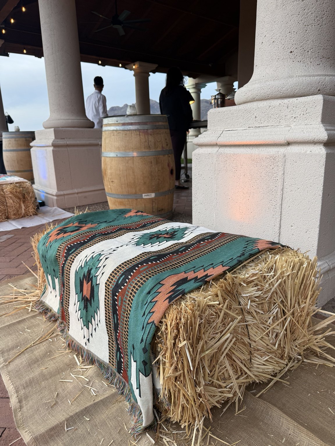 Hay bale topped with a blanket