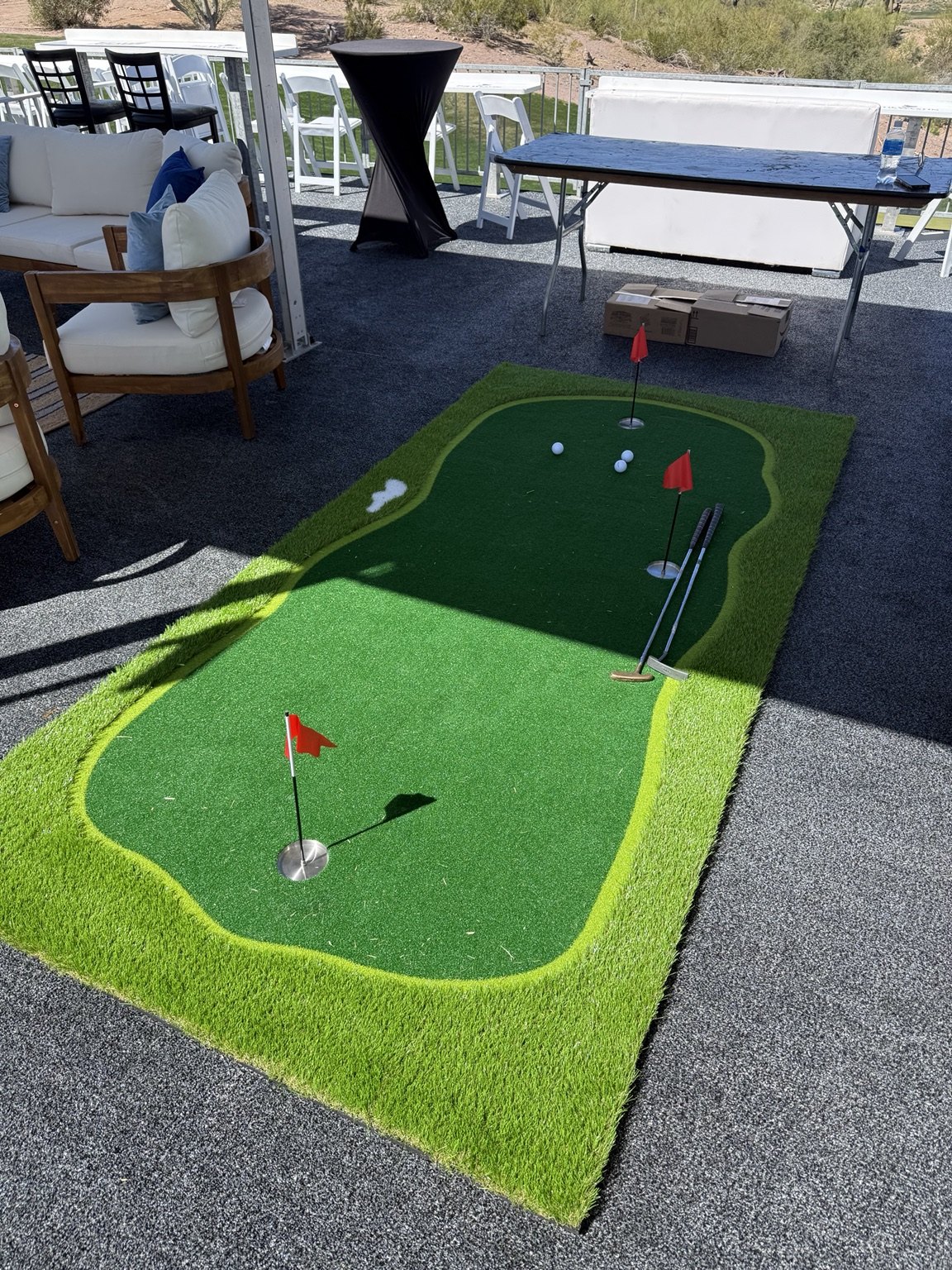 Putting mat at an outdoor event