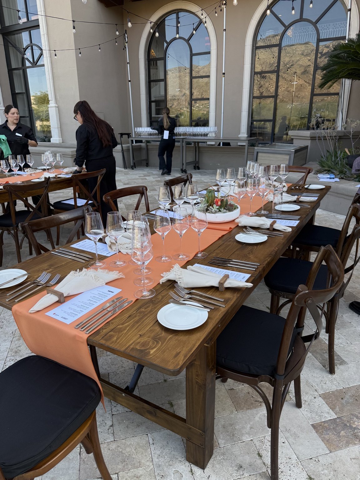 Farm table set for an outdoor dinner
